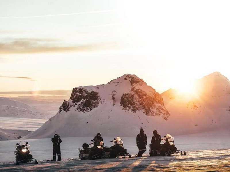 A group of people on a snowmobile tour in Iceland