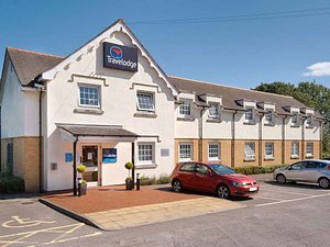 Travelodge Cardiff Airport in Barry, image may contain: Hotel, Plant, Car, Housing