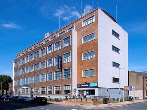 Travelodge Carlisle Central in Carlisle, image may contain: Office Building, City, Urban, Condo
