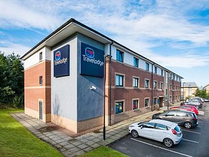 Travelodge Dunfermline in Dunfermline, image may contain: Office Building, Building, City, Car
