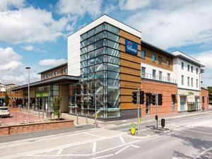 Travelodge Egham in Egham, image may contain: City, Office Building, Street, Urban