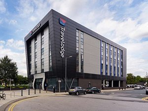 Travelodge Hull Central in Kingston-upon-Hull, image may contain: Office Building, Car, City, Convention Center