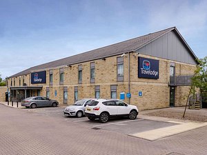 Travelodge Leeds Bradford Airport in Leeds, image may contain: Hotel, Building, Car, Vehicle
