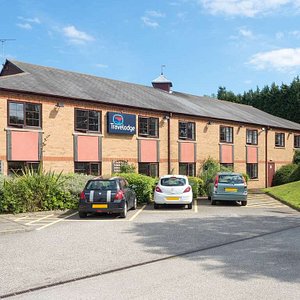 Travelodge Newcastle Airport in Newcastle upon Tyne, image may contain: Car, Vehicle, Housing, House