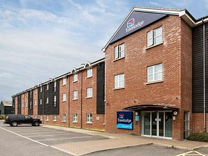 Travelodge Stansted Great Dunmow in Great Dunmow, image may contain: City, Housing, Urban, Car