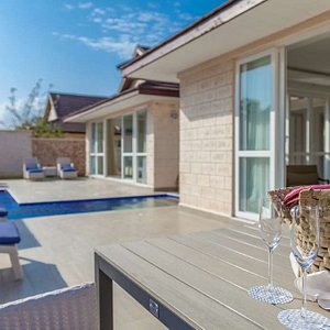 Leopard Beach Resort & Spa in Diani Beach, image may contain: Villa, Housing, Chair, Furniture