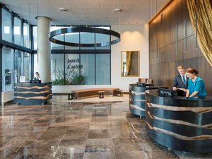 Pullman Brisbane Airport in Brisbane, image may contain: Foyer, Indoors, Floor, Table