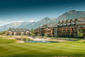 Bighorn Meadows Resort in Radium Hot Springs, image may contain: Resort, Hotel, Field, Nature