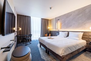 Novotel Liverpool Paddington Village in Liverpool, image may contain: Hotel, Furniture, Home Decor, Chair