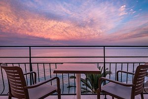 Best Western Premier Hotel Prince De Galles in Menton, image may contain: Chair, Furniture, Balcony, Sky