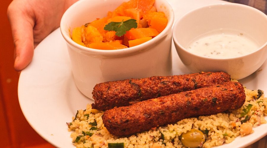 Moroccan Tagine and Koftas - served with couscous salad and tzatziki.