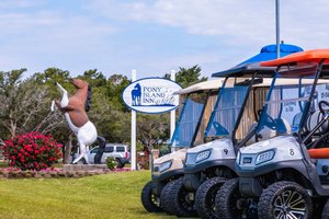 Pony Island Inn in Ocracoke, image may contain: Car, Vehicle, Transportation, Person