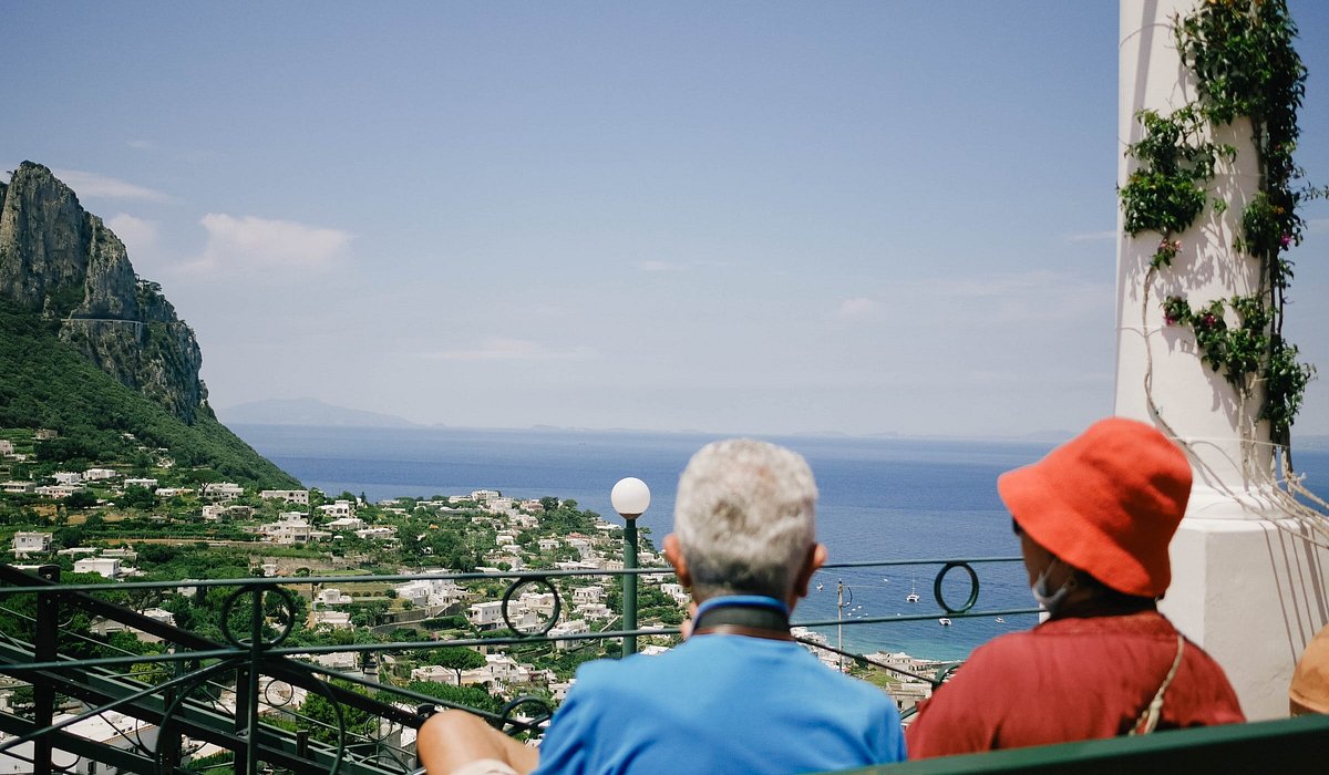 A couple overlooking Capri, Metropolitan City of Naples, Italy