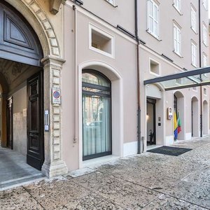 Best Western Premier Milano Palace Hotel in Modena, image may contain: Street, City, Urban, Arch