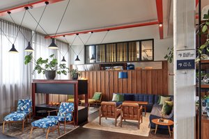 Grandi by Center Hotels in Reykjavik, image may contain: Interior Design, Living Room, Plant, Table