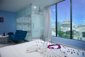 Apple Hotel Penang in Penang Island, image may contain: Penthouse, Building, Bed, Furniture