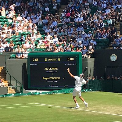 Roger Federer playing at Wimbledon tennis Championships in England
