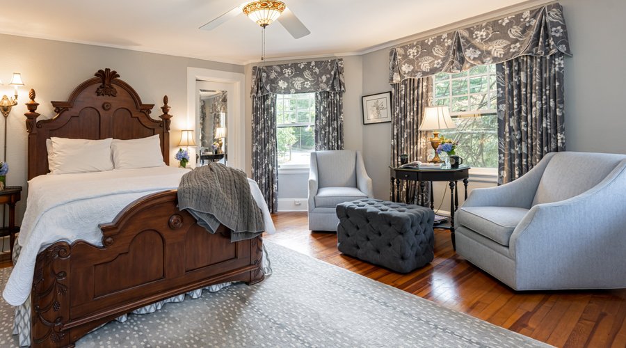 Thomas Wolfe Suite with a regal mahogany queen bed.  