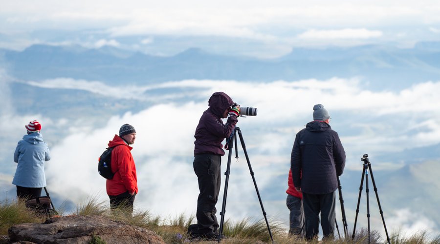 A group of landscape photographers enjoying the morning's photography session, up above Tugela Falls.