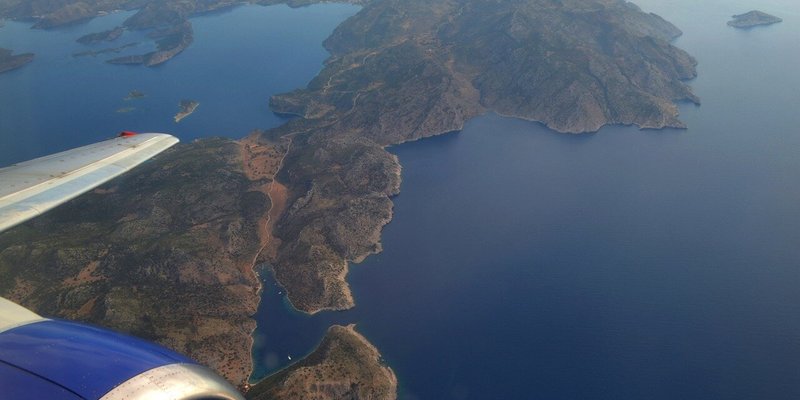 Plane flying over Greece.