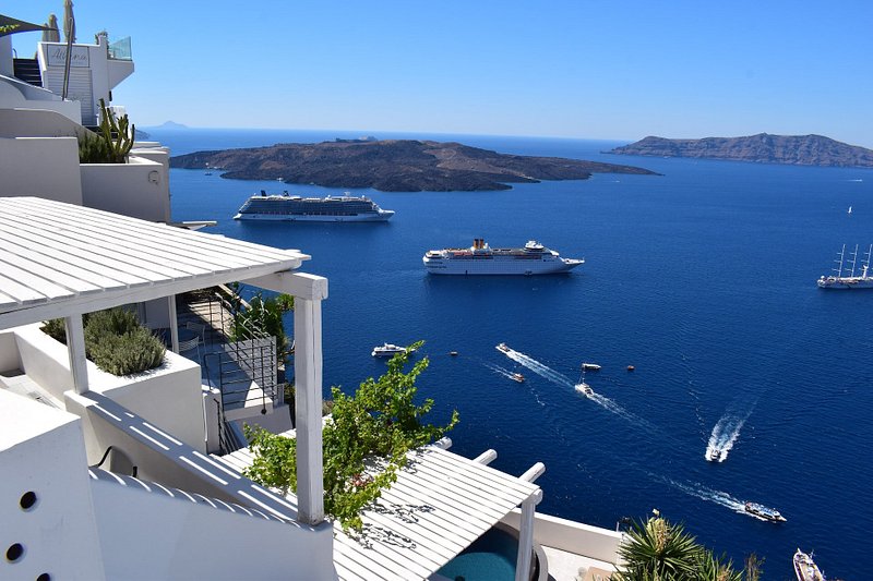 Cruises, boats and ferries on the waters of Santorini, Greece