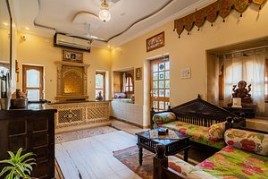 Hotel Fifu in Jaisalmer, image may contain: Home Decor, Living Room, Room, Couch