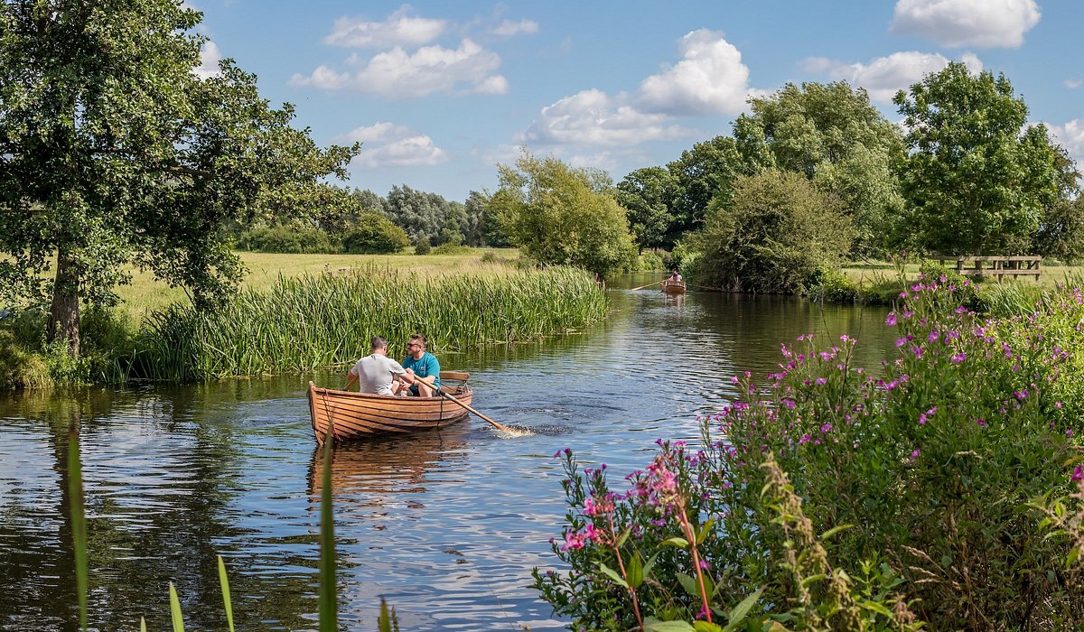 Rowing boats on the River Stour from Deadham to Flatford Mill in England