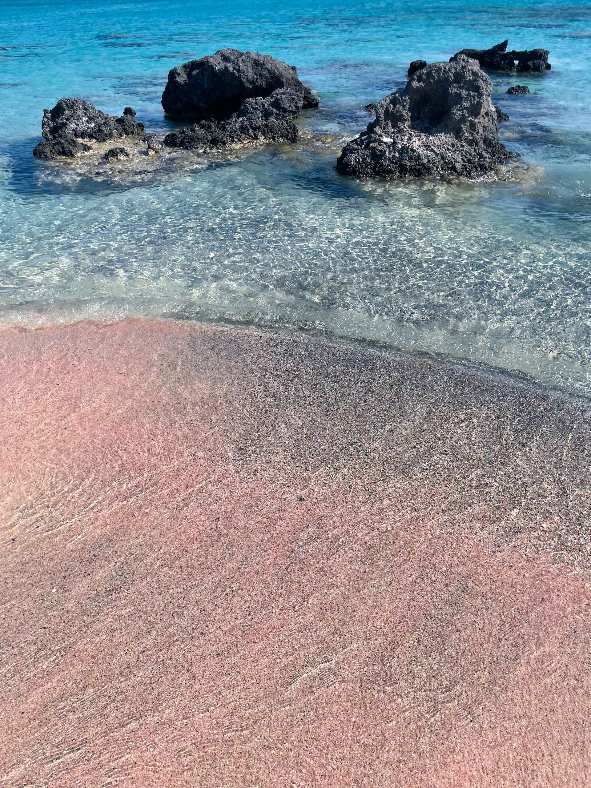 Discover the Beauty of Crete's Pink Beach: A Traveler's Guide