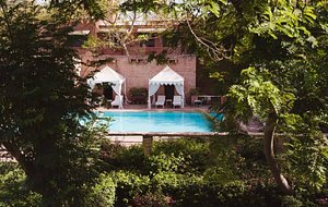 Devi Bhawan in Jodhpur, image may contain: Resort, Hotel, Villa, Pool