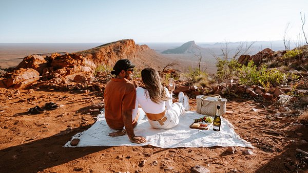 Couple having a picnic on the East MacDonnell Ranges