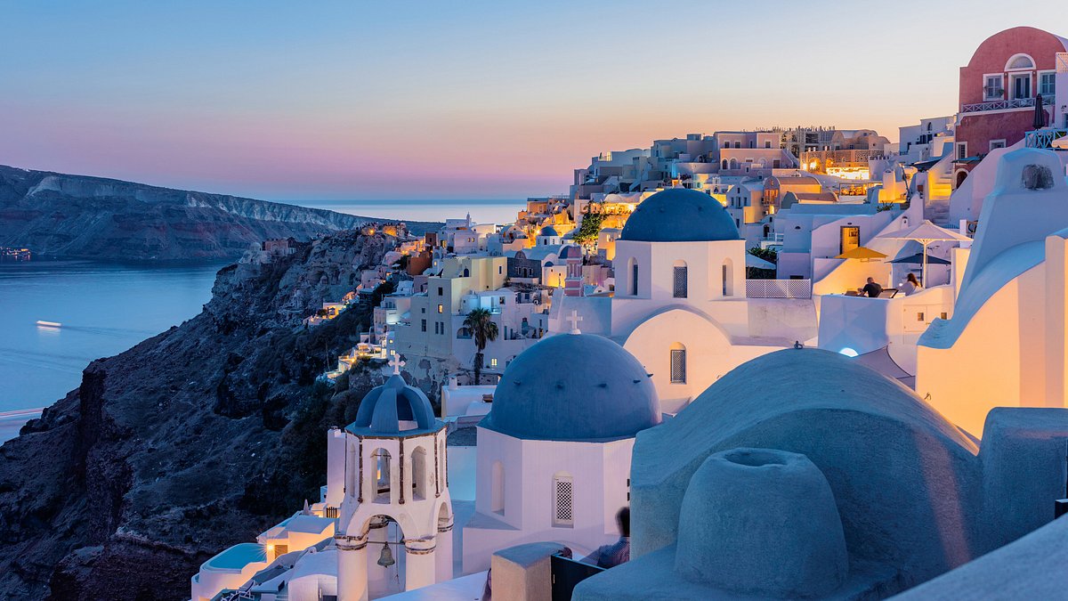 Houses and churches after sunset on Oia, Santorini