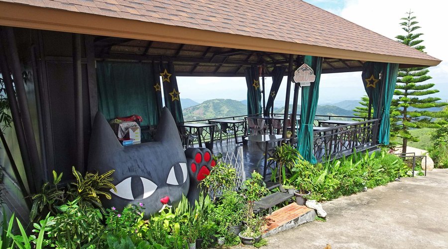 Resort check-in area and restaurant.
