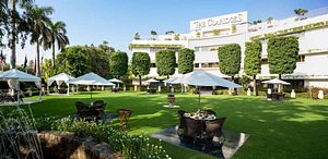 The Claridges New Delhi in New Delhi, image may contain: Resort, Hotel, Villa, Grass