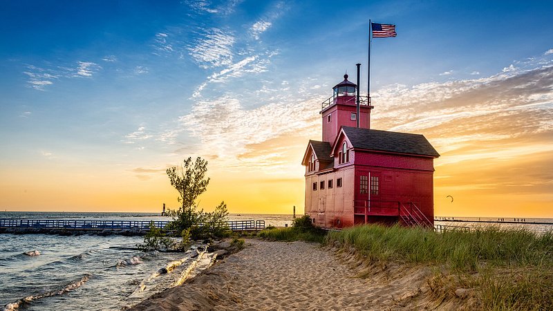 Holland Harbor Lighthouse at Sunset on Lake Michigan