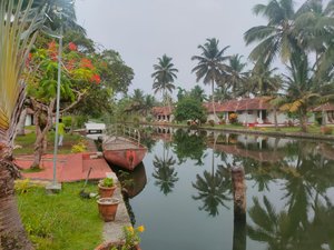 Ayurwakeup Ayurveda & Yoga Retreat in Alappuzha, image may contain: Resort, Hotel, Plant, Person