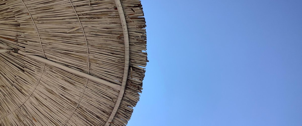 Is this sky blue enough? Walked to the nearest quiet beach cafe, free sun beds, good WiFi and frappe delivered to my sun bed for 2.5€, 0.5 of that was a tip! Swimming glorious too and NO throbbing music!