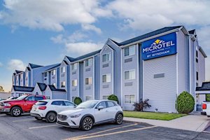 Microtel Inn & Suites By Wyndham Plattsburgh in Plattsburgh, image may contain: Housing, Building, Car, Pickup Truck