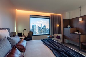 Next Hotel Melbourne in Melbourne, image may contain: Screen, Monitor, Bed, Penthouse