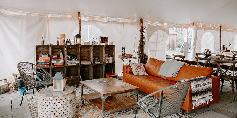 Tented communal area at Firelight Camps in Ithaca, New York 