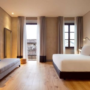 NH Collection Torino Piazza Carlina in Turin, image may contain: Indoors, Furniture, Living Room, Couch