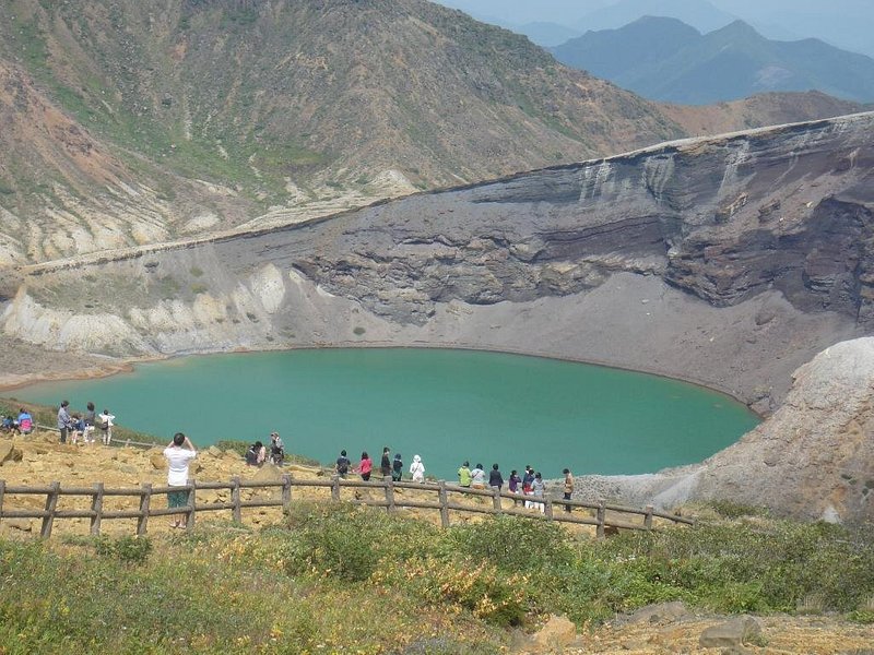 People taking photos and admiring the caldera