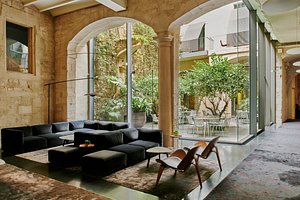 Mercer Hotel Barcelona in Barcelona, image may contain: Couch, Living Room, Villa, Table