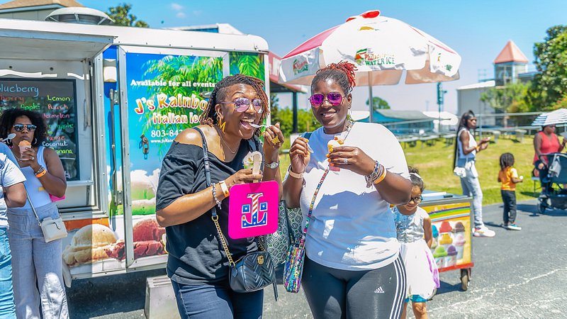 Two festival attendees at the Black Food Truck Festival