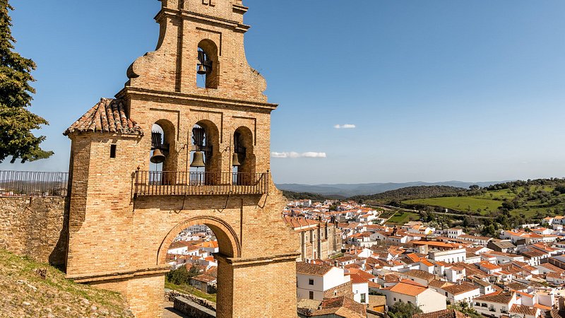 View of historic bell tower and picturesque Aracena, in Huelva, Andalusia, Spain. 