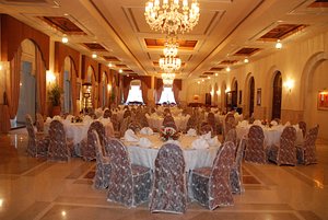 Islamabad Serena Hotel in Islamabad, image may contain: Indoors, Ballroom, Reception Room, Dining Table