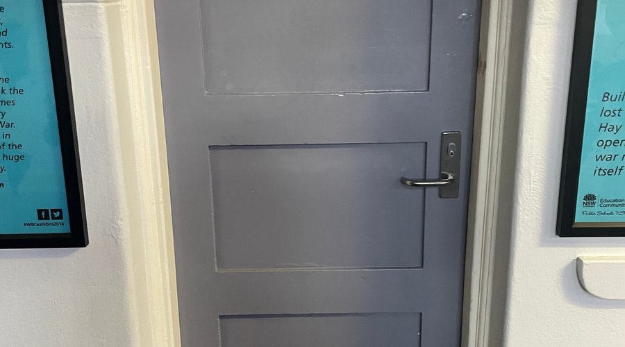 Hay War Memorial High School Museum- small door under stairwell