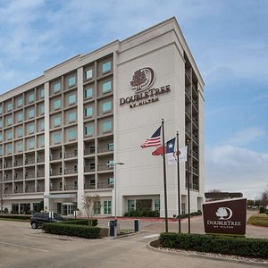 DoubleTree by Hilton Hotel Dallas - Love Field in Dallas, image may contain: Office Building, Flag, Car, Hotel