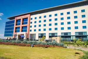 Hilton Garden Inn Nairobi Airport in Nairobi, image may contain: Office Building, Hotel, Hospital, Condo