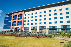 Hilton Garden Inn Nairobi Airport in Nairobi, image may contain: Office Building, Hotel, Hospital, Condo