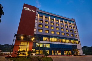 Hilton Garden Inn Lucknow in Lucknow, image may contain: Office Building, Hotel, Resort, City